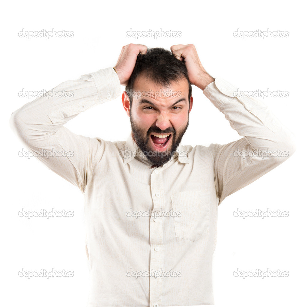 Young man furious over white background