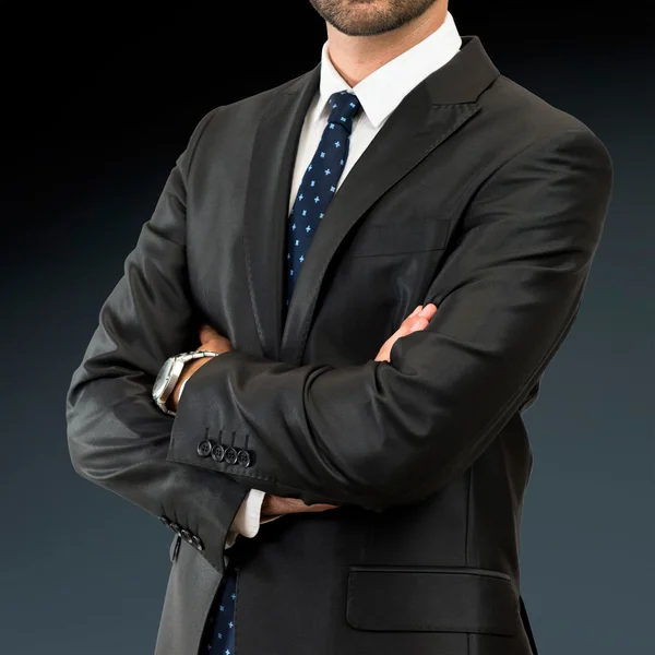 Business man with his arms crossed over isolated background — Stock Photo, Image