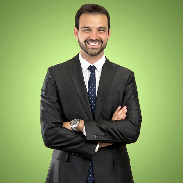 Business man with his arms crossed over isolated background — Stock Photo, Image