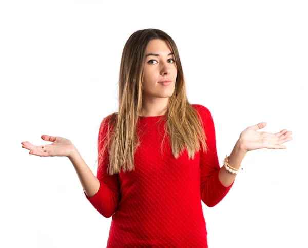 Cute young girl having doubts over isolated white background — Stock Photo, Image