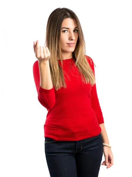 Chica joven haciendo un gesto de dinero sobre fondo blanco —  Fotos de Stock