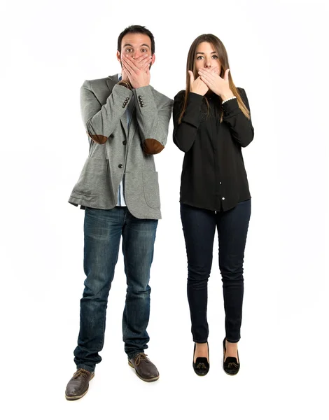Couple surprised over white background — Stock Photo, Image