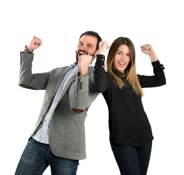 Beyaz arka plan üzerinde çift kazanan