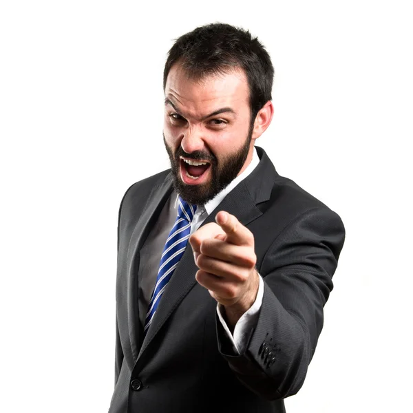 Hombre de negocios enojado y gritando sobre fondo blanco aislado — Foto de Stock