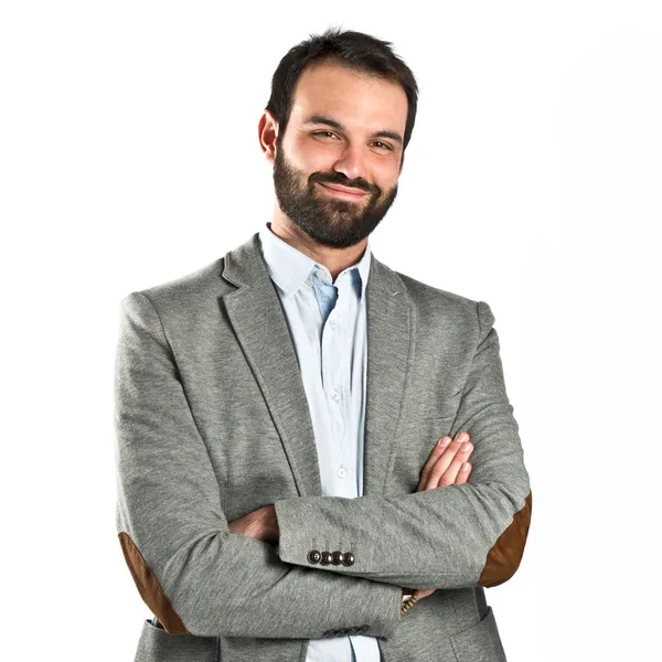 Businessman with arms crossed over isolated background — Stock Photo, Image