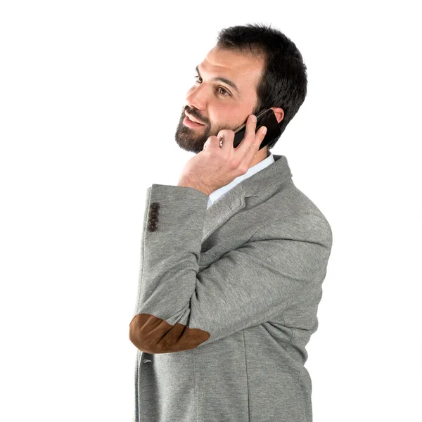 Men talking to mobile over isolated background. — Stock Photo, Image