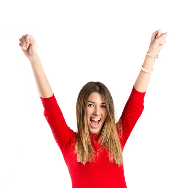 Junge Frau gewinnt auf weißem Hintergrund — Stockfoto