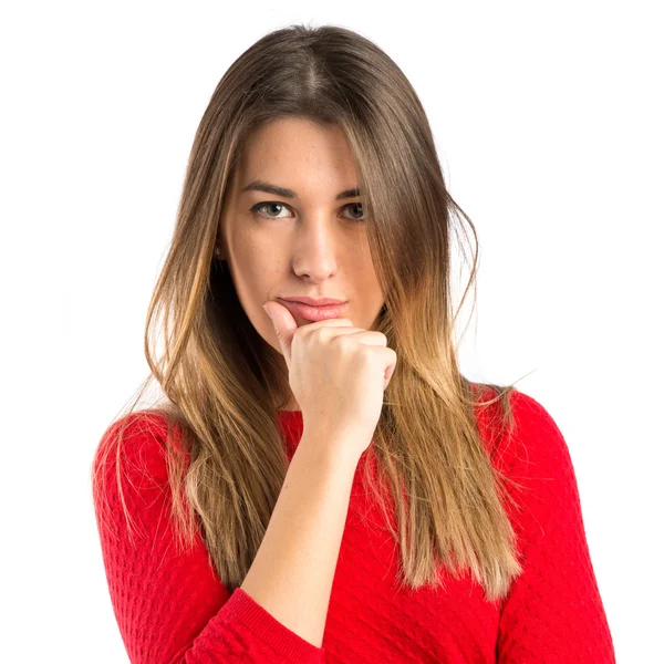 Cute young girl thinking an idea over isolated white background — Stock Photo, Image