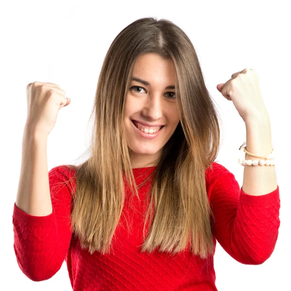 Young woman winner over isolated white background — Stock Photo, Image