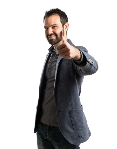 Business man making an OK gesture over isolated white background — стоковое фото