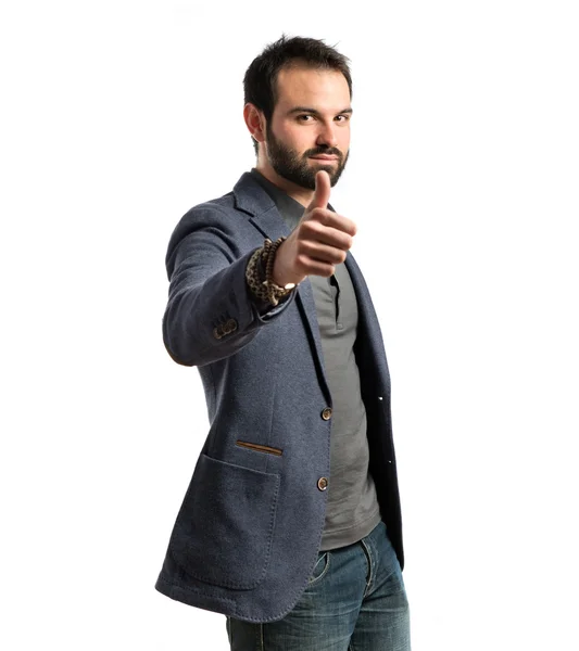 Business man making an OK gesture over isolated white background — стоковое фото