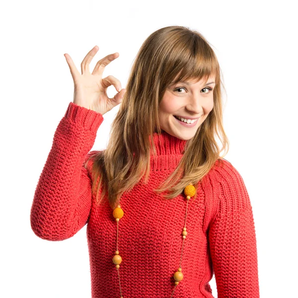 Young woman making Ok sign over white background — Stock Photo, Image