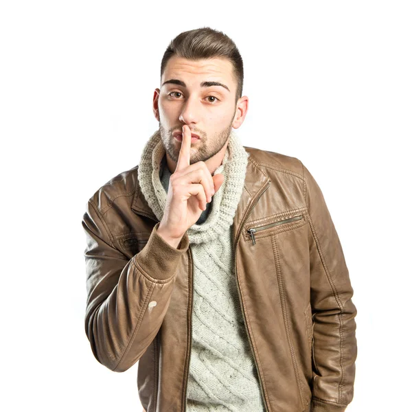 Mladý muž dělat mlčení gesto izolované bílém pozadí — Stock fotografie