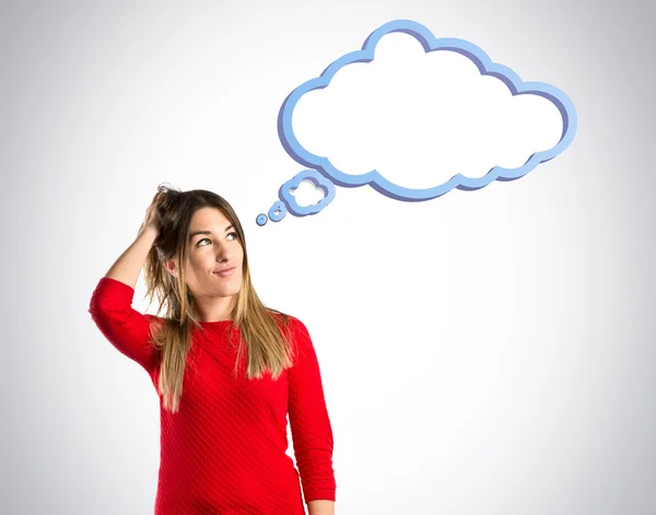 Young girl thinking over isolated grey background — Stock Photo, Image