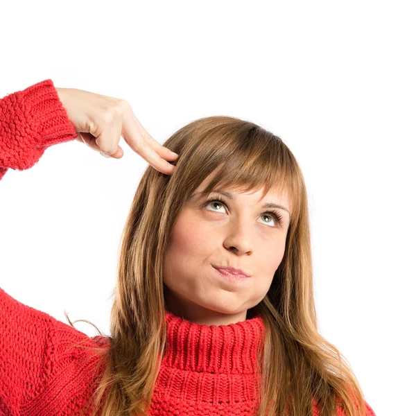 Young girl making suicide gesture over white background — Stock Photo, Image