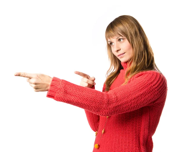 Young pretty woman pointing over white background — Stock Photo, Image