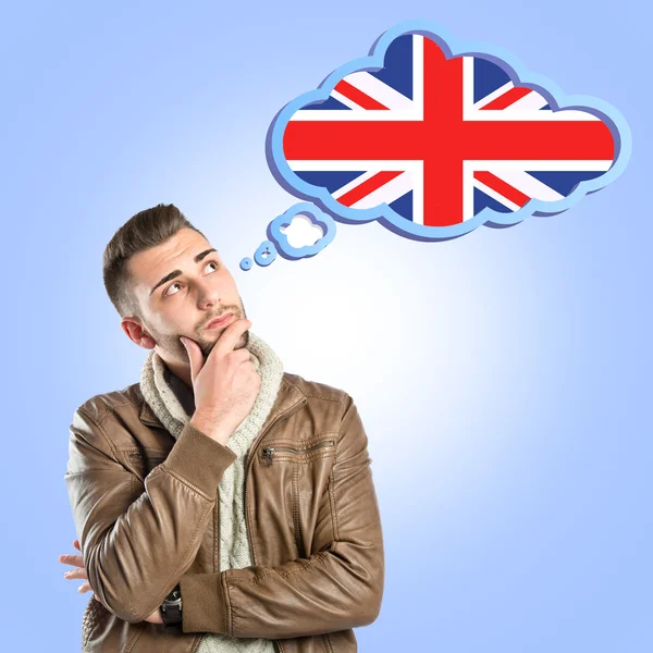 Young man thinking in english — Stock Photo, Image