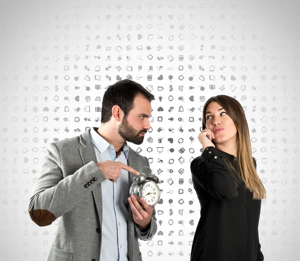 Angry man because his girlfriend has been late for an appointment — Stock Photo, Image