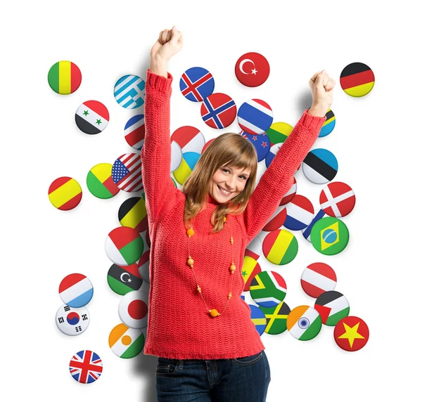 Young woman winner over background with flags — Stock Photo, Image