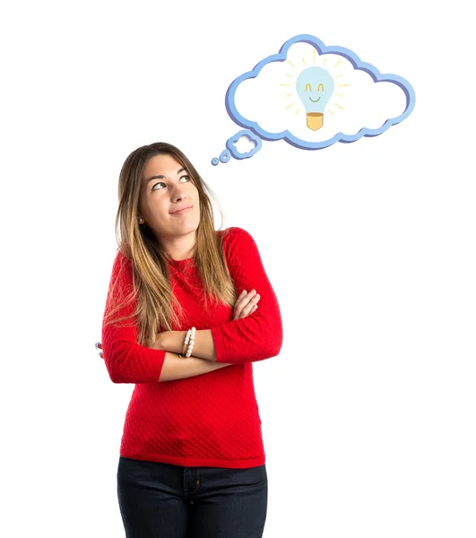 Menina bonito pensando uma ideia sobre fundo branco isolado — Fotografia de Stock