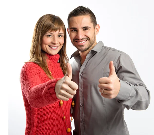 Pareja haciendo Ok signo sobre fondo blanco —  Fotos de Stock