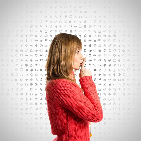 Chica joven haciendo gesto de silencio sobre el fondo del icono — Foto de Stock