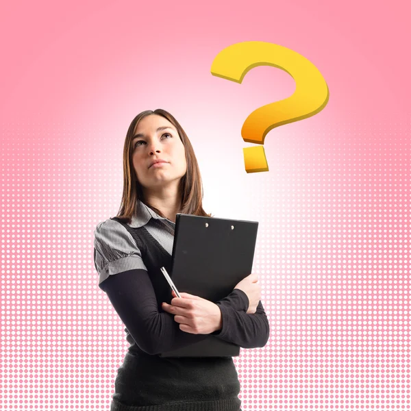 Young student thinking over pink background — Stock Photo, Image