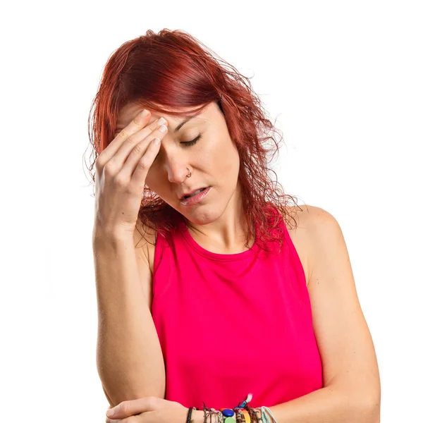 Cute girl with headache over isolated white background — Stock Photo, Image