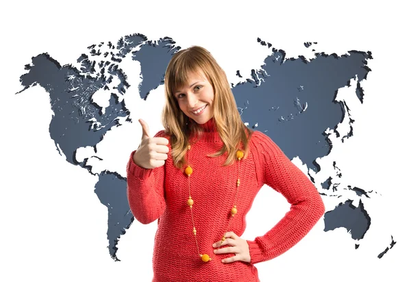 Young woman making Ok sign over map world background — Stock Photo, Image