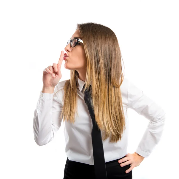 Young businesswoman making silence gesture over isolated white background — Stock Photo, Image