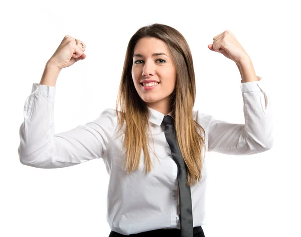 Jovem empresária conquistando fundo branco — Fotografia de Stock