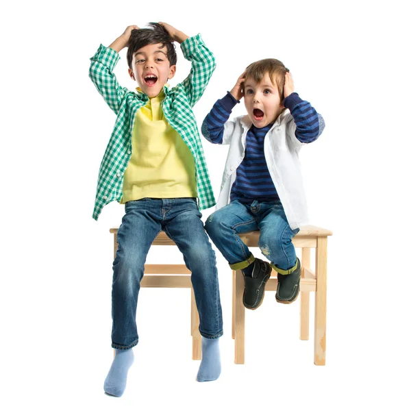 Kids frustrated over white background — Stockfoto
