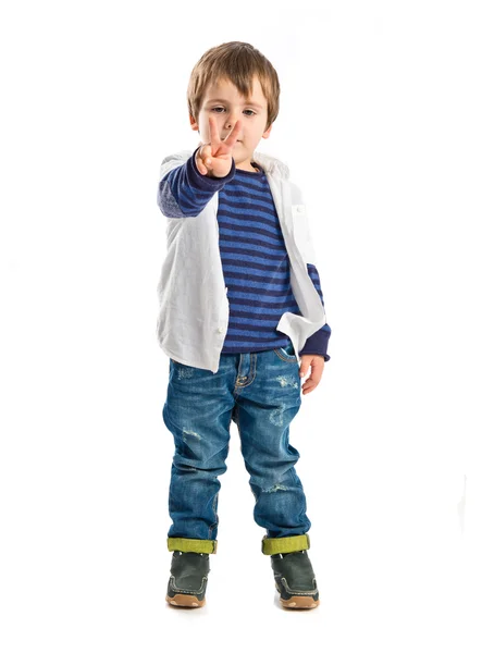 Boys making a victory sign on wooden chair over white background — Stock Photo, Image