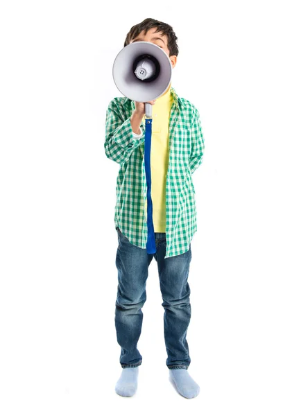 Criança gritando por megafone sobre fundo branco — Fotografia de Stock
