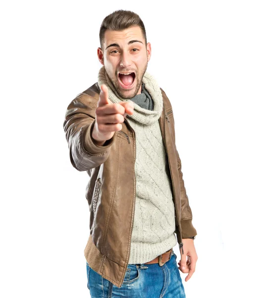 Young man pointing over isolated white background — Stock Photo, Image