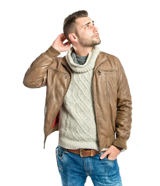 Young man thinking over white background — Stock Photo, Image