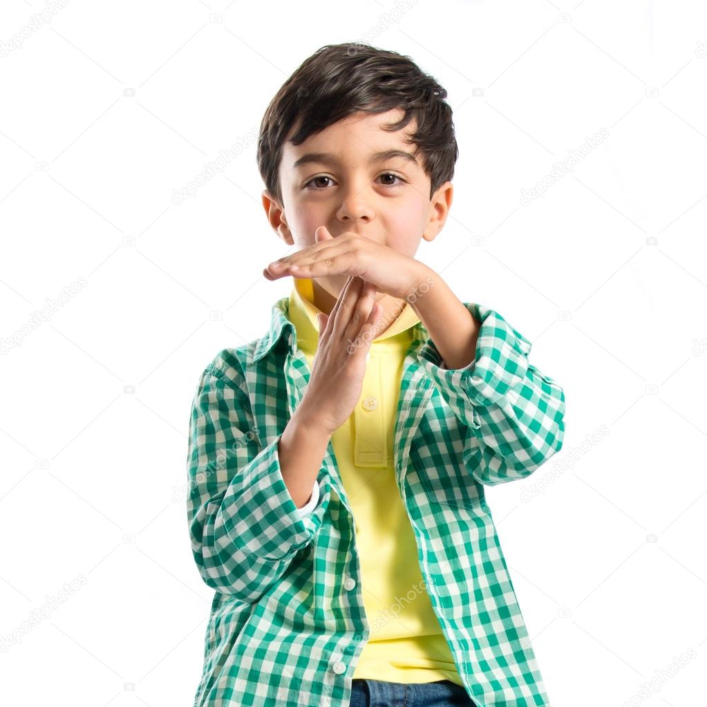 Kid making time out gesture over white background 