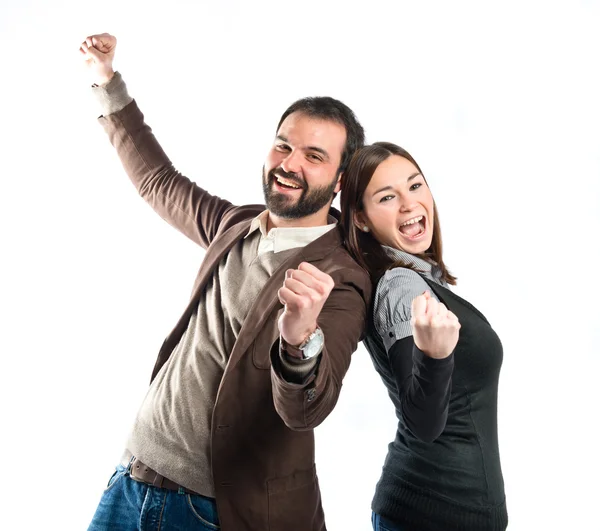 Pareja ganadora sobre fondo blanco — Foto de Stock