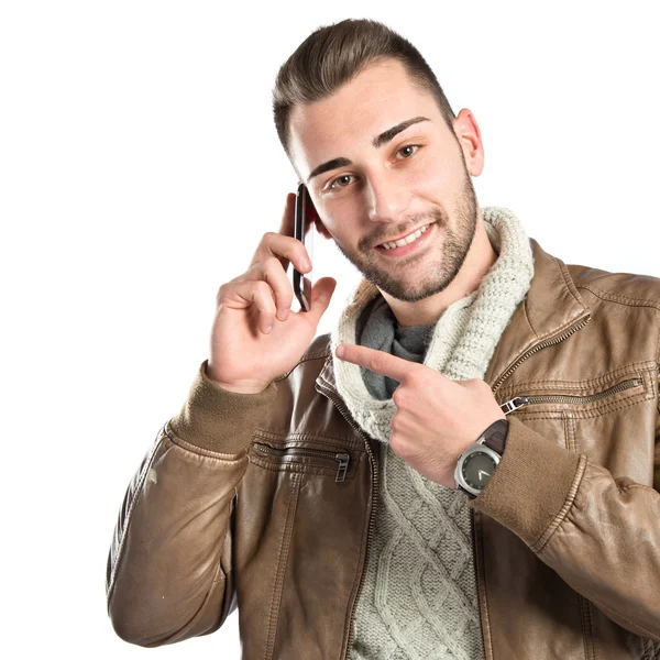 Jóvenes hombres de negocios hablando con móviles sobre un fondo aislado . —  Fotos de Stock