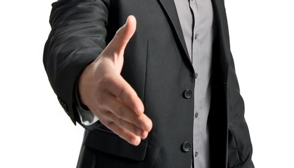 Hombre de negocios haciendo un trato sobre fondo blanco aislado — Foto de Stock