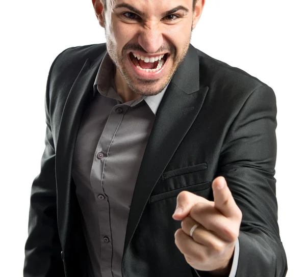Businessman angry and shouting over isolated white background — Stock Photo, Image
