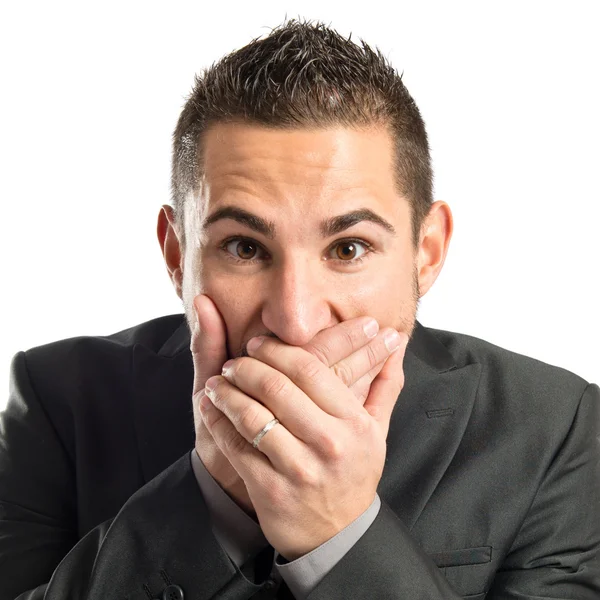 Young man doing surprise gesture over white background — Stock Photo, Image