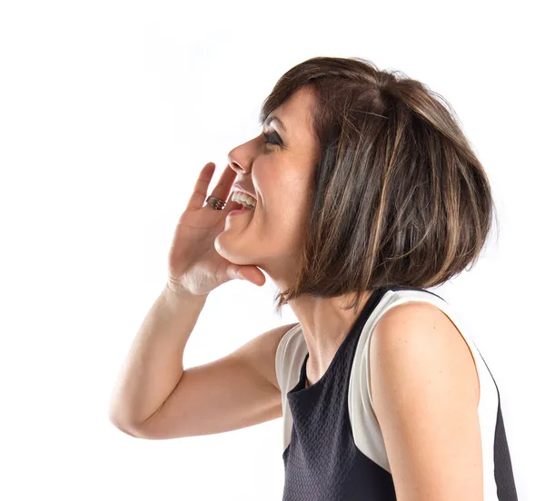 Adult girl shouting over isolated white background — Stock Photo, Image