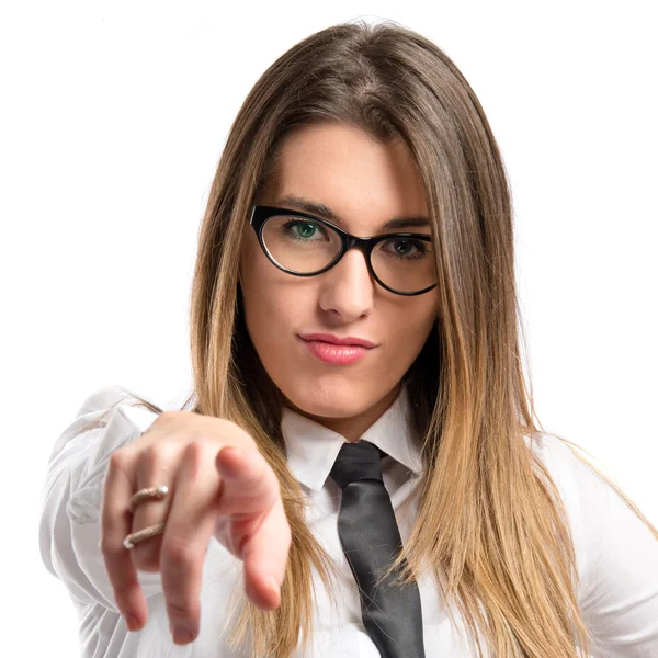 Joven mujer de negocios bonita señalando sobre fondo blanco — Foto de Stock