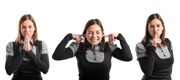 Woman in black clothes pleading, covering her ears, and doing silence gesture — Stock Photo, Image