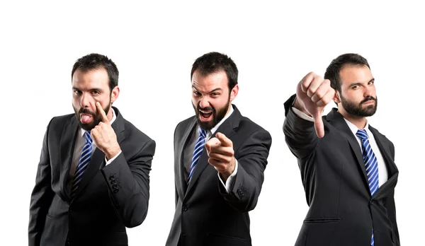 Young businessman making a mockery, a bad sign, and shouting — Stock Photo, Image