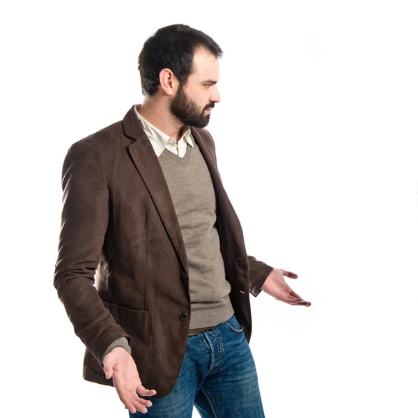 Young man surprised over white background — Stock Photo, Image