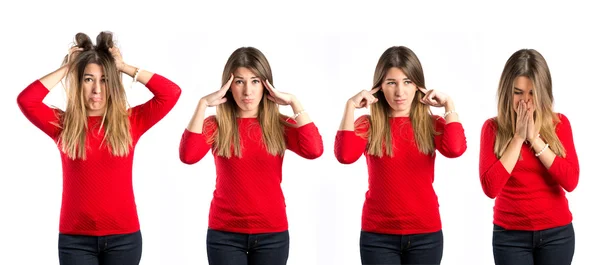 Cute girl covering her ears, and frustrated over isolated white background — 图库照片