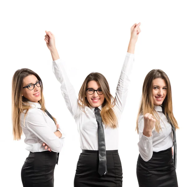 Young businesswoman winning on white background — Stock Photo, Image