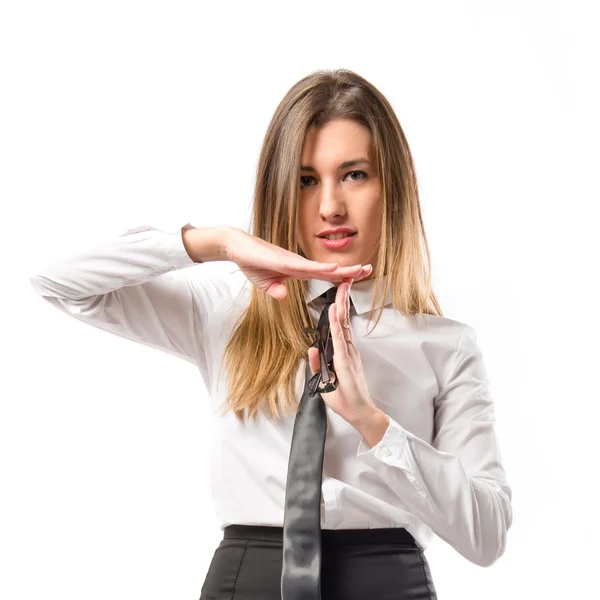 Young girl making time out gesture over white background — Stock Photo, Image